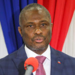 Que fait la diplomatie de Jean Harvel Jean Baptiste pour protéger les bénéficiaires du programme Biden